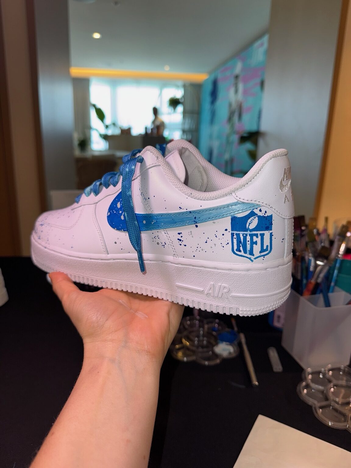 NFL-themed custom sneaker produced for a Miami experiential brand activation