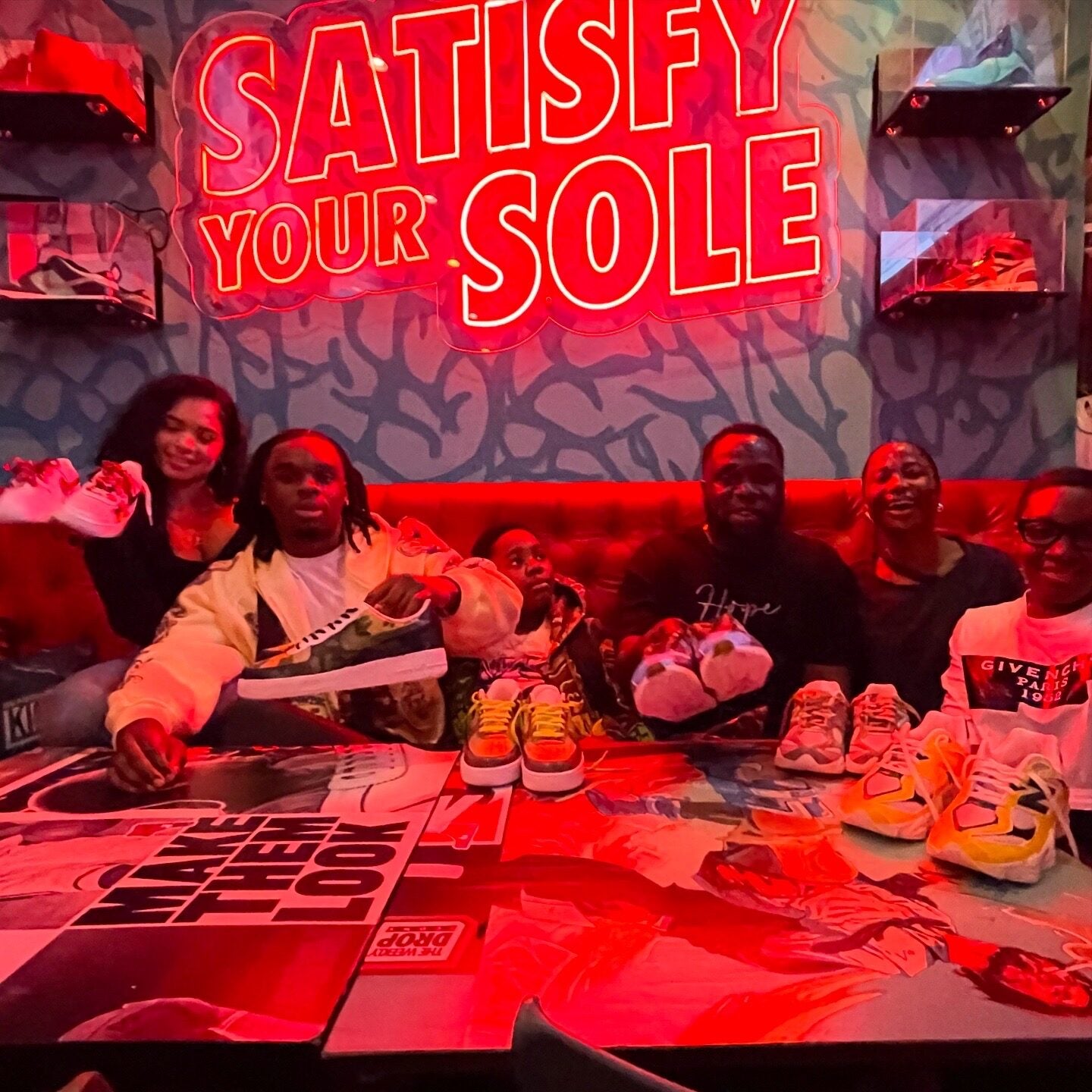 Birthday group enjoying a private custom sneaker party in Wynwood Miami